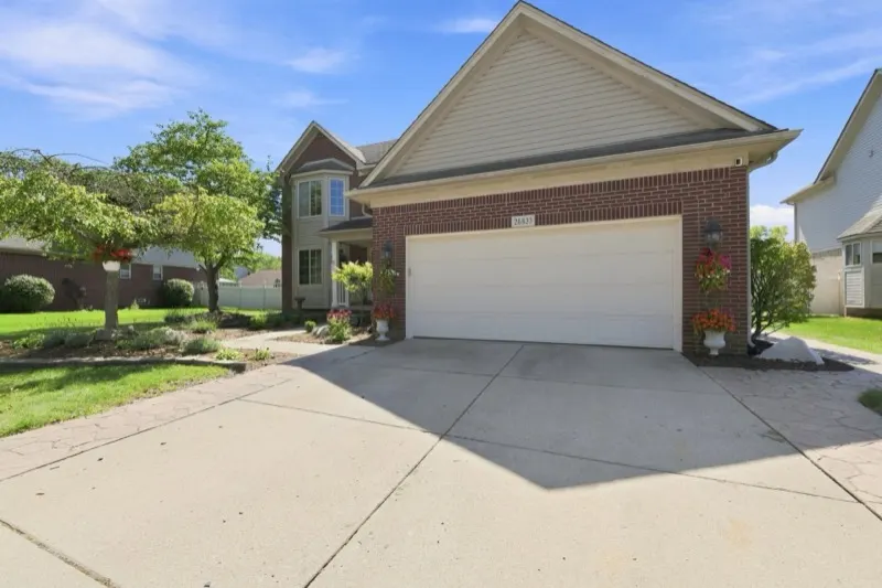 Driveway and attached two-car garage