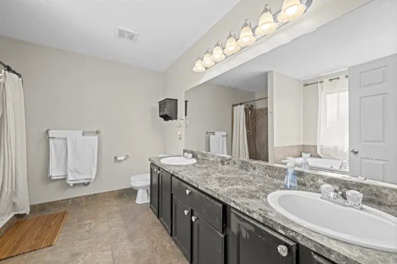 Primary bath with dual vanities