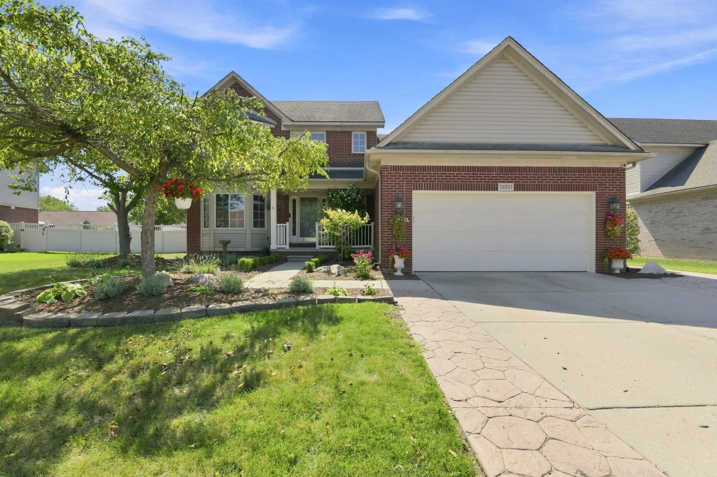 Front of 26833 Arcadia Drive, a two-story brick colonial